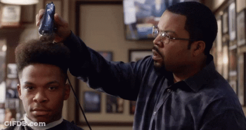 Man With Glasses Cutting Hair GIF