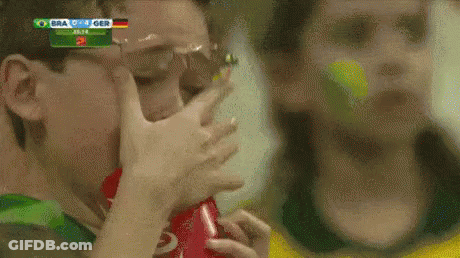 Man With Glasses Drinking Coca Cola Watching Brazil Vs Germany GIF