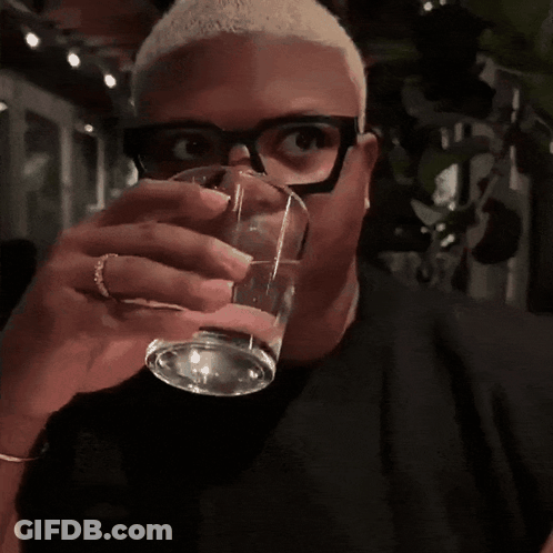Man With Glasses Drinking From Glass GIF