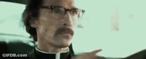 Man With Glasses Driving And Pointing GIF