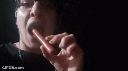 Man With Glasses Eating Hot Dog GIF