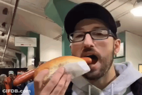 Man With Glasses Eating Hot Dog GIF