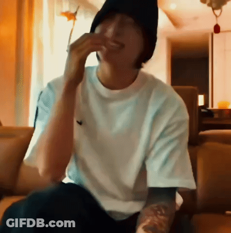 Man With Glasses Eating On Couch GIF