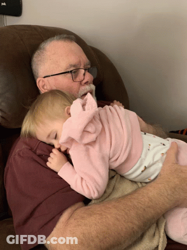 Man With Glasses Holding Baby GIF