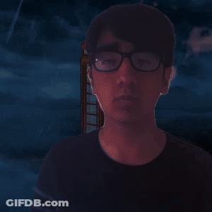Man With Glasses Holding Banana GIF