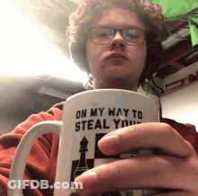 Man With Glasses Holding Coffee Mug Saying On My Way To Steal You GIF