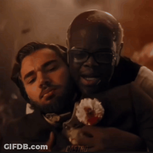 Man With Glasses Holding Flower GIF
