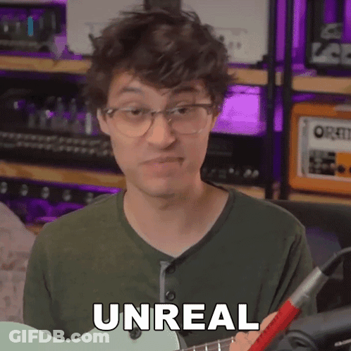 Man With Glasses Holding Guitar Saying Unreal GIF