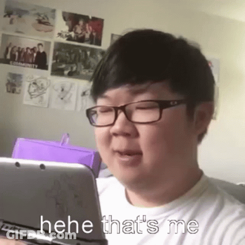Man With Glasses Holding Nintendo 3DS Making Funny Face GIF