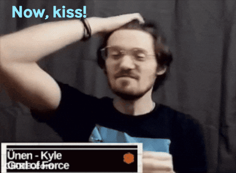 Man With Glasses Holding Now Kiss Card GIF