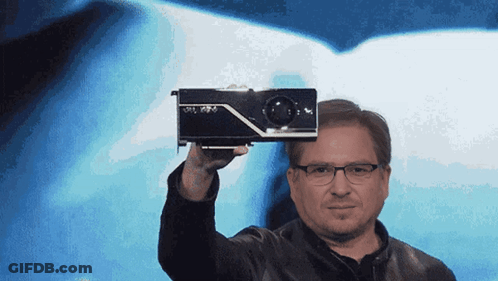 Man With Glasses Holding NVIDIA Graphics Card GIF