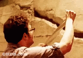 Man With Glasses Holding Paper GIF