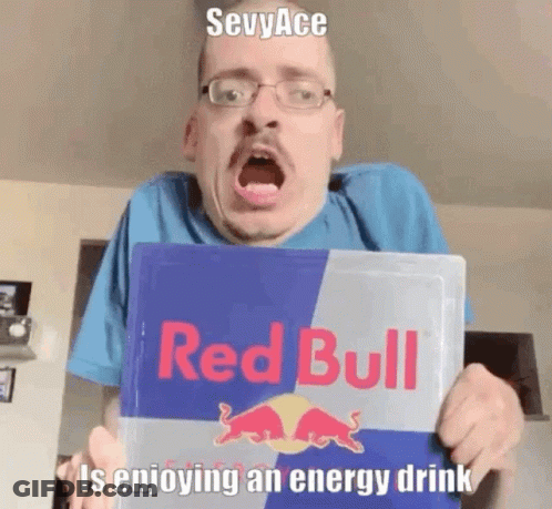 Man With Glasses Holding Red Bull Sign GIF