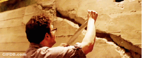 Man With Glasses Holding Tape GIF