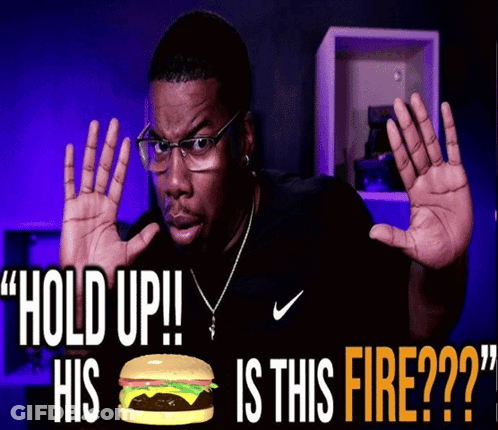 Man With Glasses Holding Up Hands In Front Of Hamburger Saying Hold Up GIF