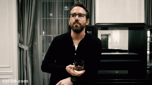 Man With Glasses Holding Whiskey GIF
