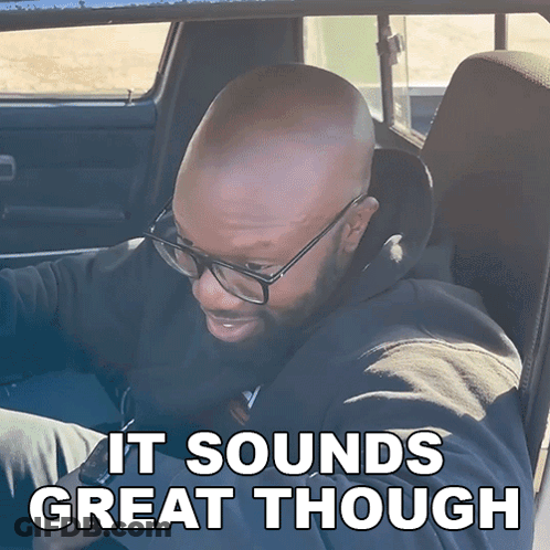 Man With Glasses In Car Saying It Sounds Great Though GIF