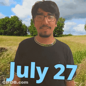 Man With Glasses In Field July 27 GIF