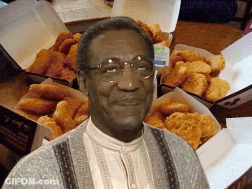 Man With Glasses In Front Of Chicken Boxes GIF
