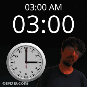 Man With Glasses In Front Of Clock Saying 03:00 AM GIF