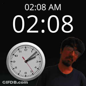 Man With Glasses In Front Of Clock Saying 2:08 AM GIF