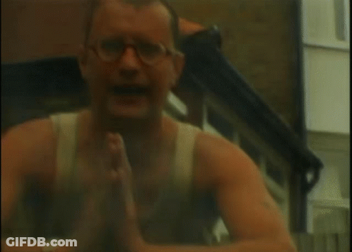 Man With Glasses In Front Of House GIF