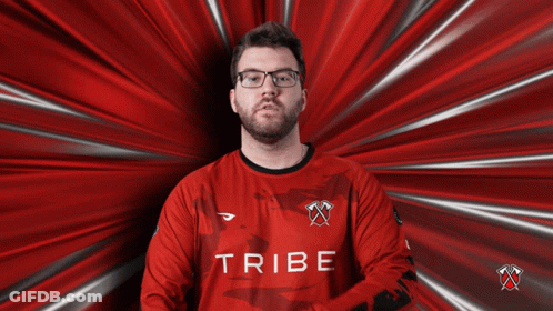 Man With Glasses In Front Of Red Background Fear The Tribe GIF