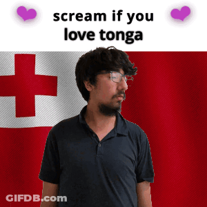 Man With Glasses In Front Of Tonga Flag GIF