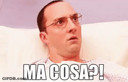 Man With Glasses Laying In Hospital Bed Ma Cosa GIF