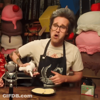 Man With Glasses Looking At Camera GIF