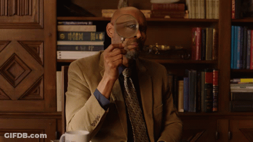 Man With Glasses Looking At Cell Phone GIF