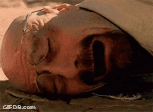 Man With Glasses Lying Eyes Closed Mouth Open GIF