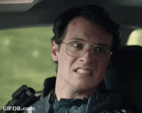 Man With Glasses Making Funny Face In Car GIF