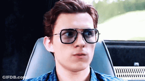 Man With Glasses Making Funny Face In Car GIF