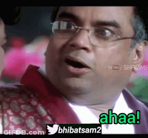 Man With Glasses Making Funny Face Saying Ahaa GIF