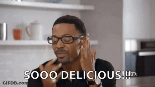 Man With Glasses Making Funny Face Saying Sooo Delicious GIF