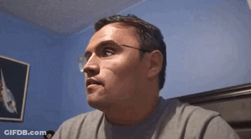 Man With Glasses Making Funny Face GIF