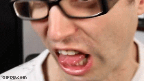 Man With Glasses Making Funny Face Tongue Out GIF