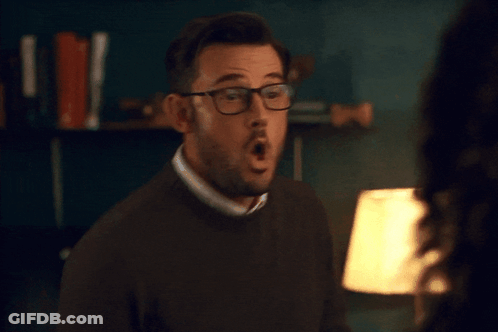 Man With Glasses Making Funny Face With Hands GIF