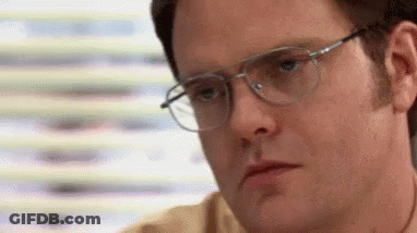 Man With Glasses Making Serious Face GIF