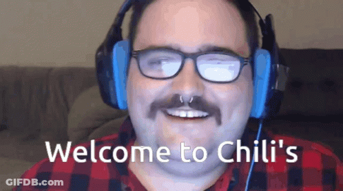 Man With Glasses Mustache And Headphones Smiling Welcome To Chili's GIF