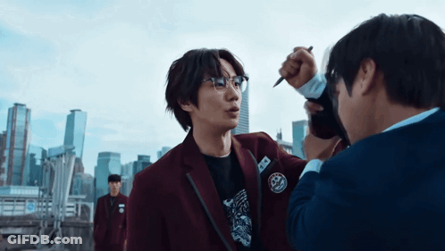 Man With Glasses Name Tag A Talking To Another GIF
