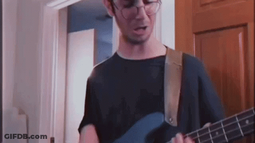 Man With Glasses Playing Blue Guitar GIF