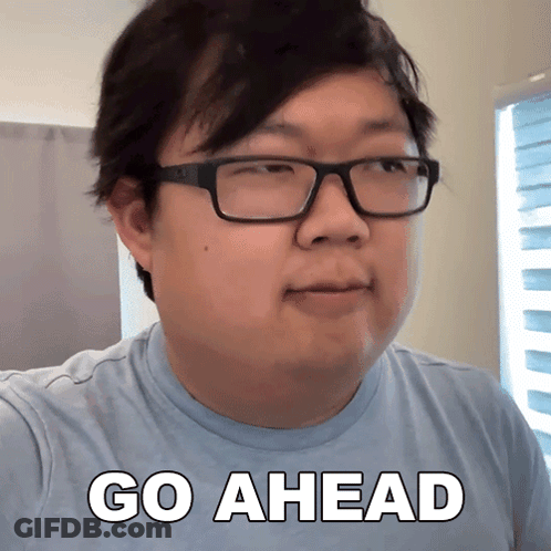 Man With Glasses Saying Go Ahead GIF