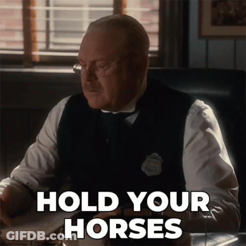 Man With Glasses Saying Hold Your Horses GIF