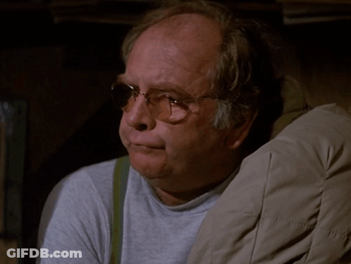 Man With Glasses Saying I Don't Know In Green Letters GIF