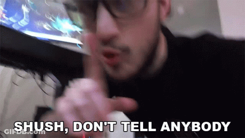 Man With Glasses Saying Shush GIF