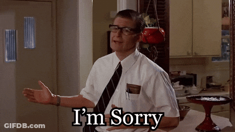 Man With Glasses Saying Sorry In Kitchen GIF