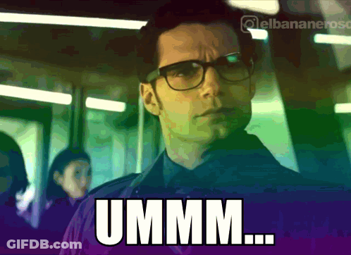 Man With Glasses Saying Ummm Purple Background GIF