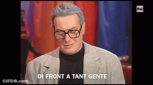 Man With Glasses Says Di Front A Tante Gente GIF